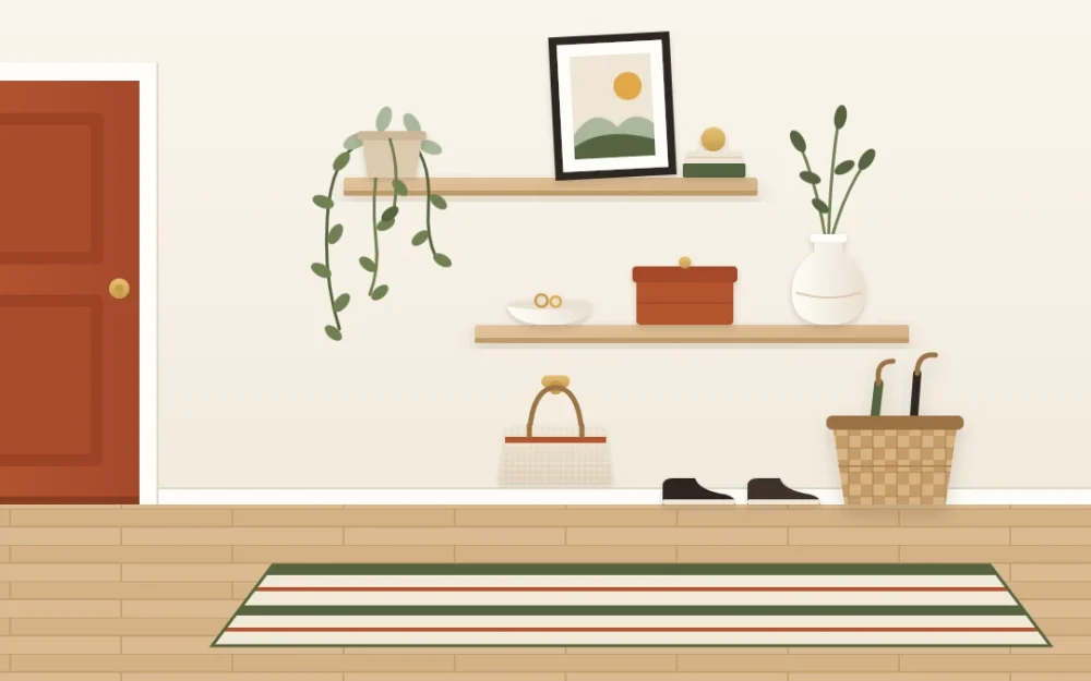Two short floating oak shelves on an entry wall with a leaning print, a trailing plant, a small dish, a vase and a lidded box