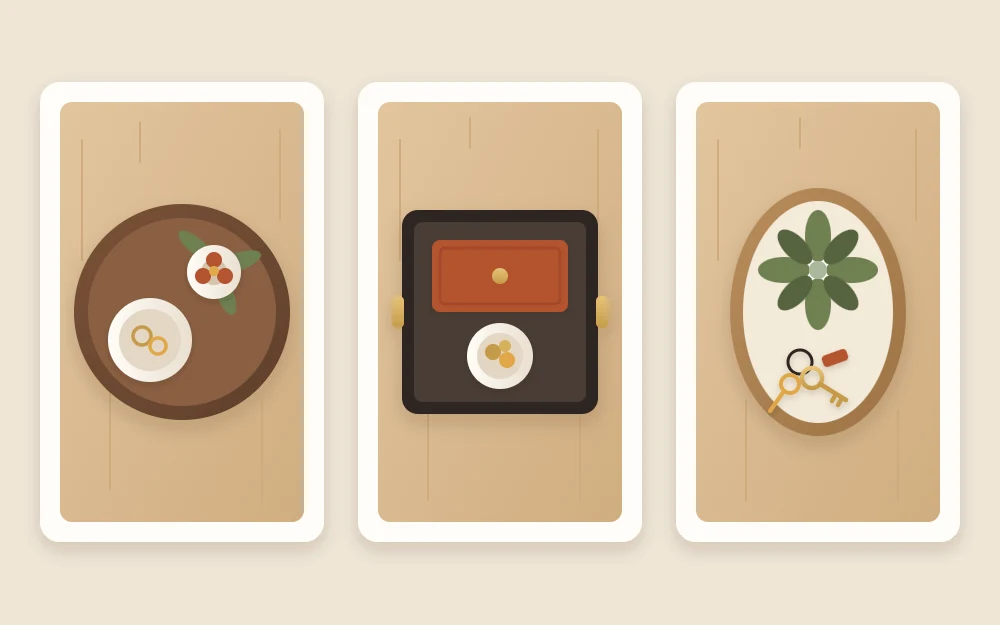 Three trays seen from above: a round tray with a bowl and vase, a rectangular tray with a box and dish, an oval tray with a plant and keys